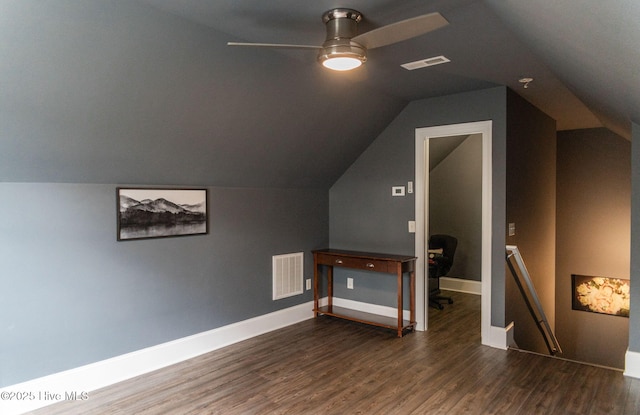 bonus room with lofted ceiling, dark wood-type flooring, and ceiling fan