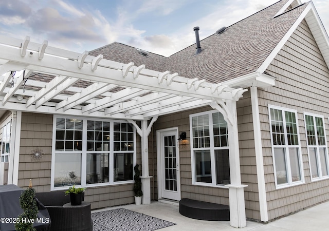 exterior space featuring a pergola and a patio