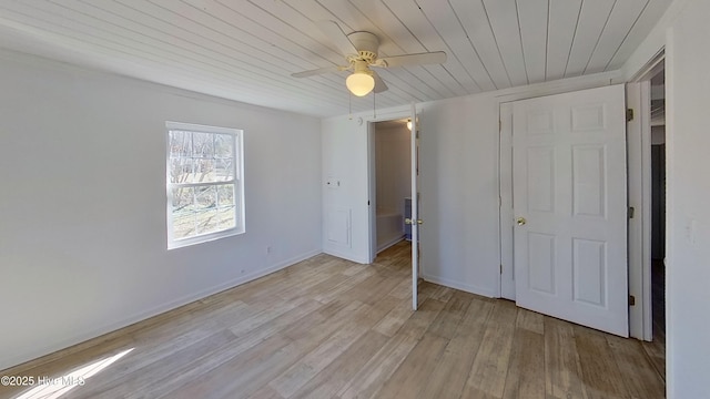 unfurnished bedroom with ceiling fan, wooden ceiling, and light hardwood / wood-style floors