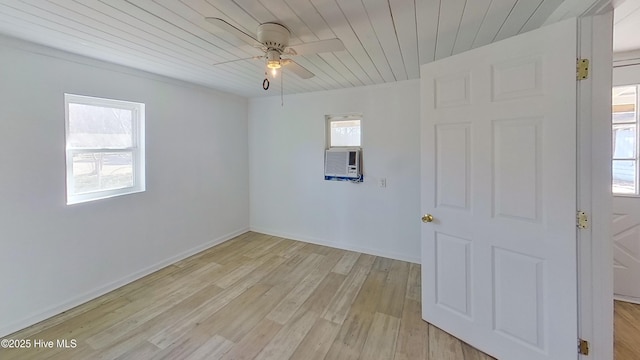 unfurnished room with cooling unit, ceiling fan, light hardwood / wood-style flooring, and wooden ceiling