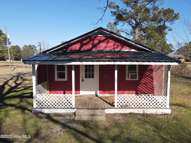 view of front of house featuring cooling unit