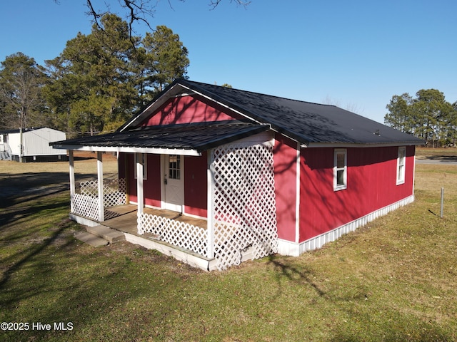 exterior space with a yard