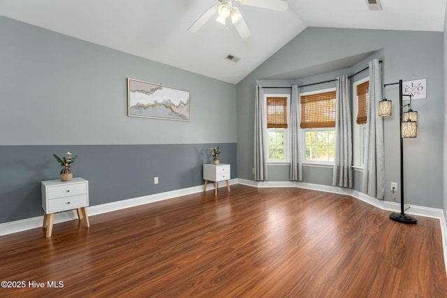 interior space featuring hardwood / wood-style flooring, ceiling fan, and lofted ceiling