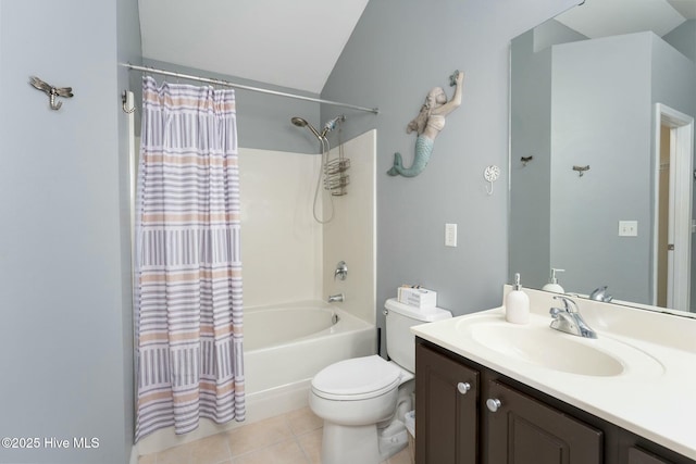 full bathroom featuring vanity, tile patterned flooring, toilet, and shower / bath combo