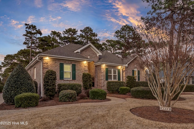 view of front of home with a yard