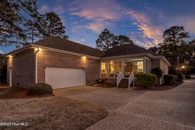 view of front facade with a garage and a porch