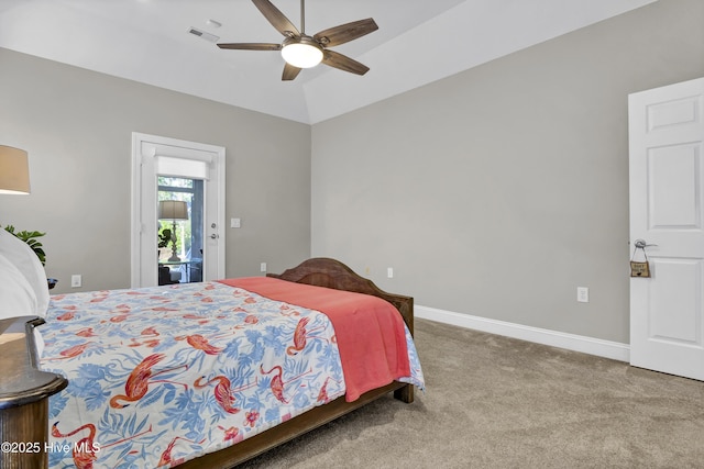 carpeted bedroom featuring vaulted ceiling and ceiling fan