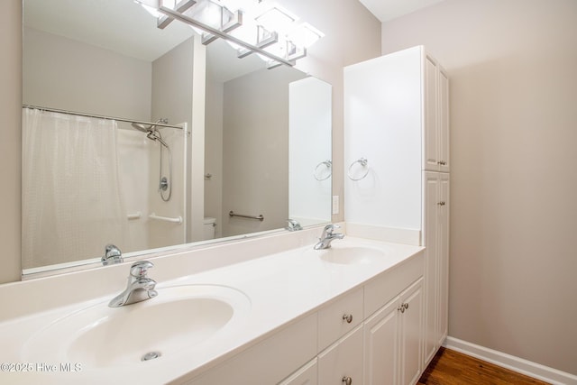 bathroom with vanity and a shower with curtain