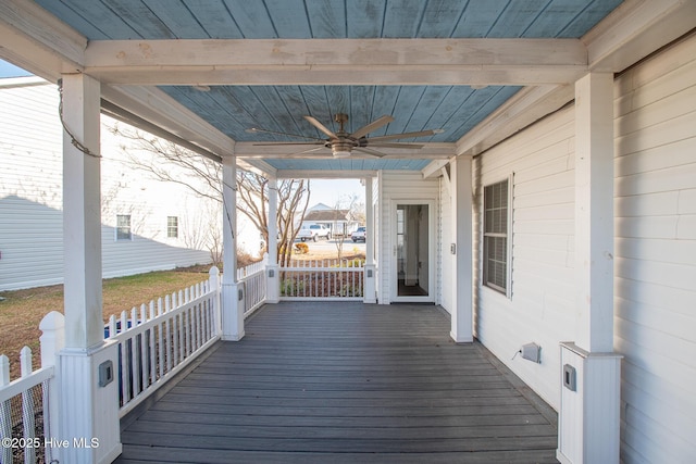 deck featuring ceiling fan and a porch