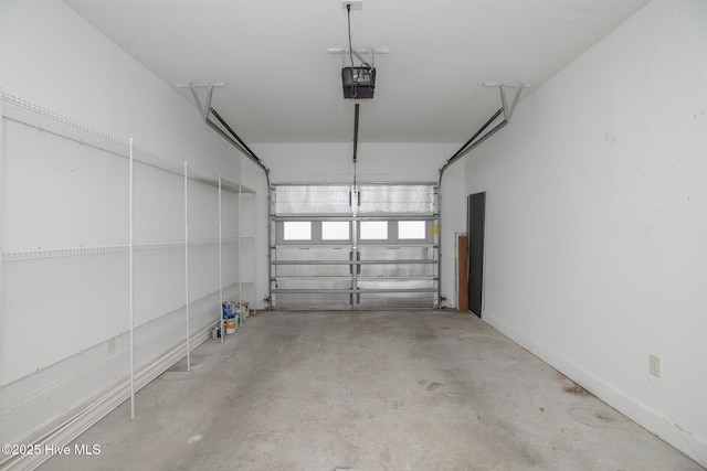 garage featuring a garage door opener