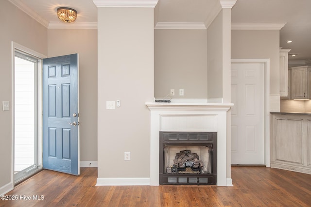 unfurnished living room featuring crown molding and dark wood-type flooring