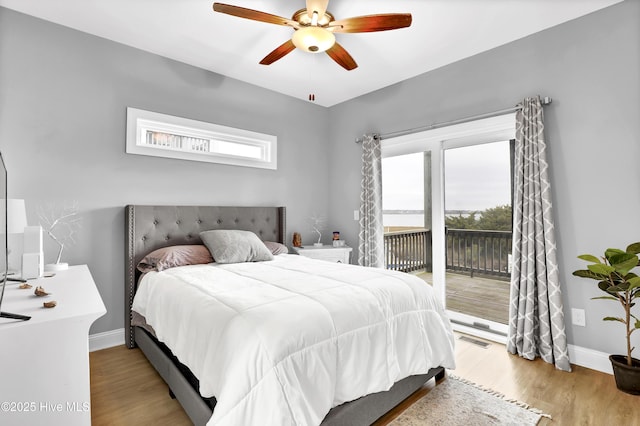 bedroom featuring ceiling fan, access to outside, and light wood-type flooring