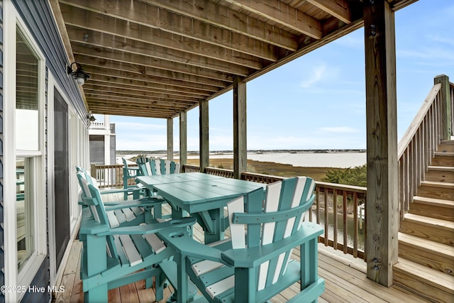 deck featuring a water view