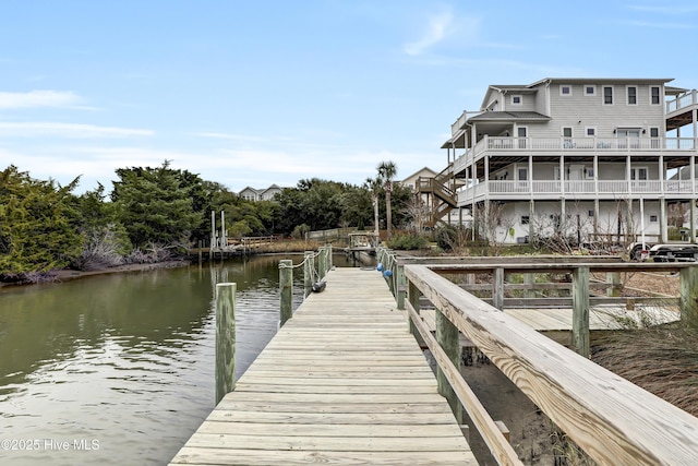 dock area with a water view