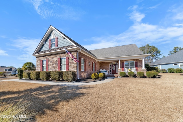 view of front property with a front yard and a porch