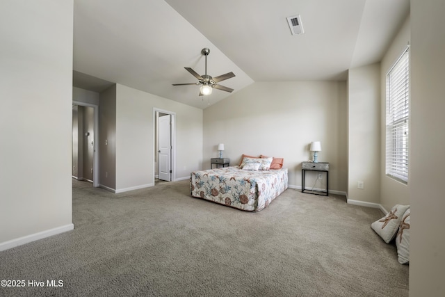 bedroom featuring lofted ceiling, carpet floors, and ceiling fan