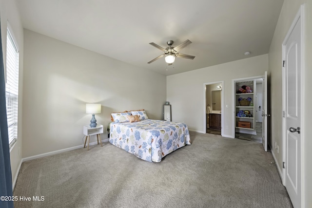 bedroom with ceiling fan, connected bathroom, and carpet flooring