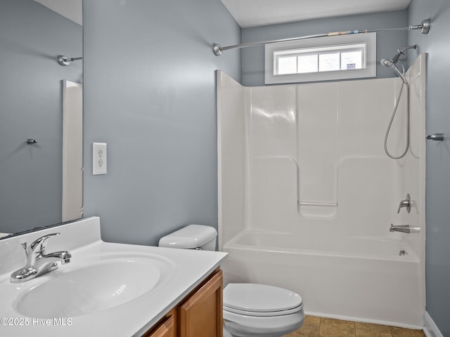 full bathroom featuring vanity, shower / tub combination, and toilet