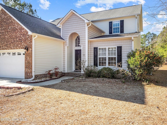 front of property featuring a garage