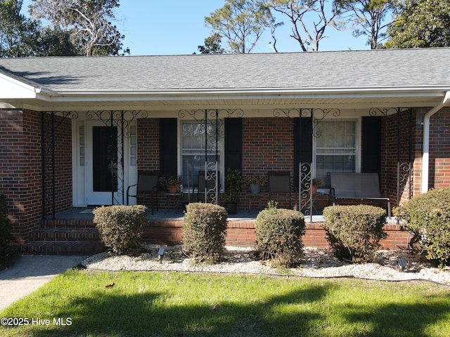 entrance to property with covered porch