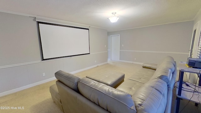 home theater with ornamental molding, light colored carpet, and a textured ceiling