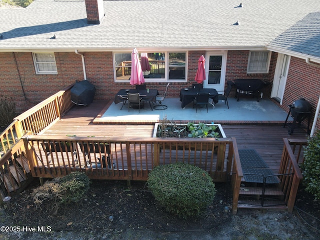 back of property with a deck