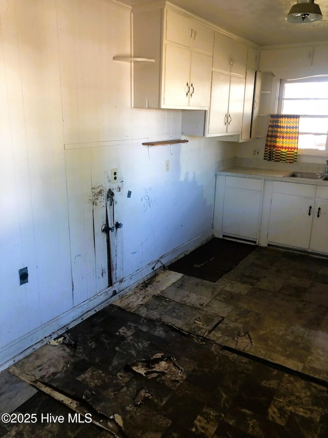 interior space with sink and cabinets