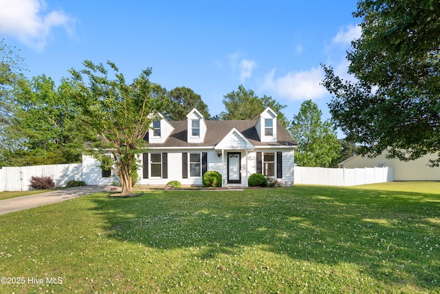 new england style home featuring a front yard, stone siding, and fence
