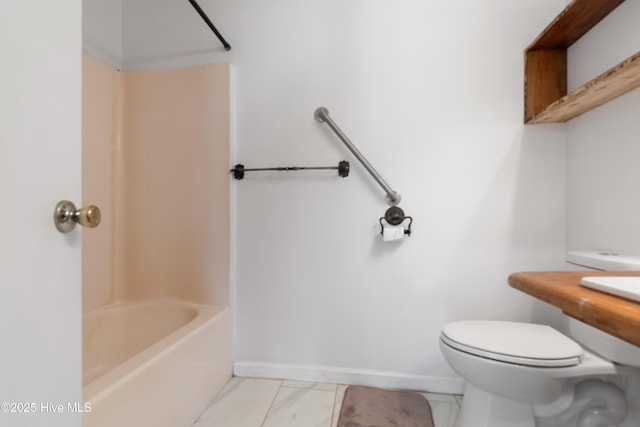 full bath featuring toilet, shower / bathtub combination, and baseboards
