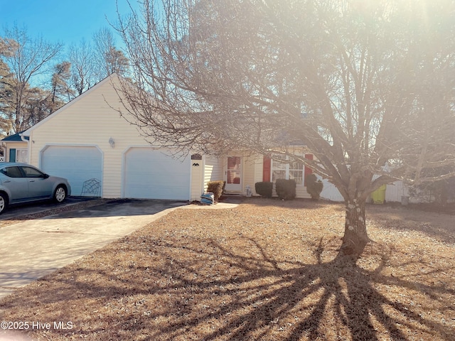 view of front facade with an attached garage and concrete driveway