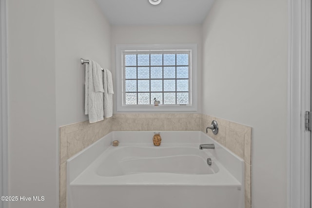 bathroom featuring a tub