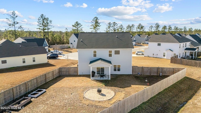 back of house featuring a patio