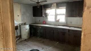 kitchen with dark brown cabinets and ceiling fan