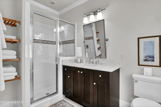 bathroom featuring a stall shower, crown molding, vanity, and toilet