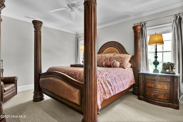 carpeted bedroom featuring crown molding, ceiling fan, visible vents, and multiple windows