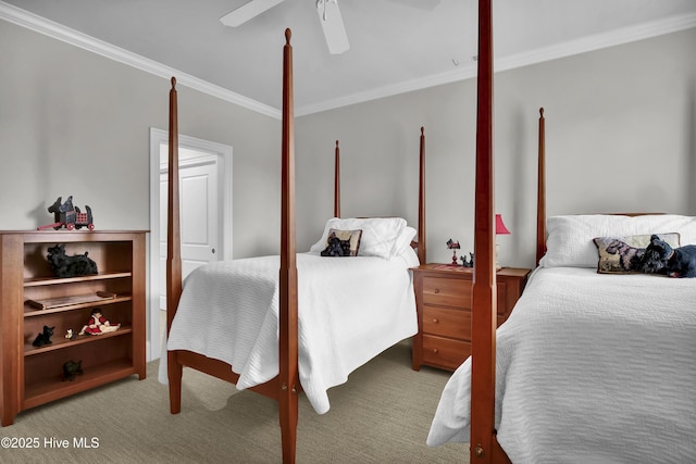 carpeted bedroom with a ceiling fan and ornamental molding
