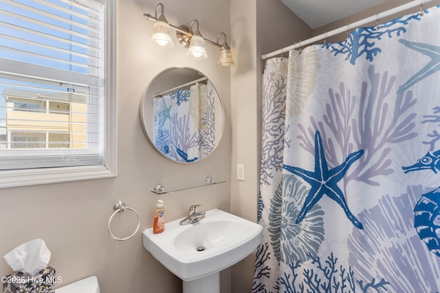 1505 Carolina Beach Ave N Unit 2F, Carolina Beach, NC 28428 - full bathroom with a sink and toilet
