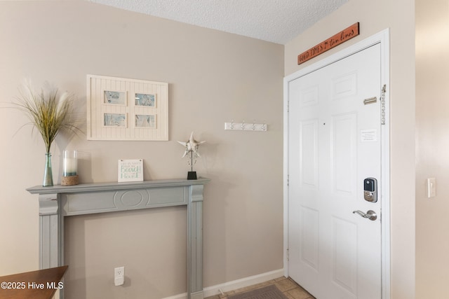 1505 Carolina Beach Ave N Unit 2F, Carolina Beach, NC 28428 - entryway with a textured ceiling and baseboards
