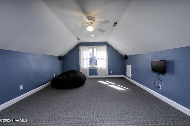 bonus room featuring lofted ceiling, ceiling fan, and carpet