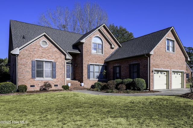 view of front property featuring a garage and a front yard