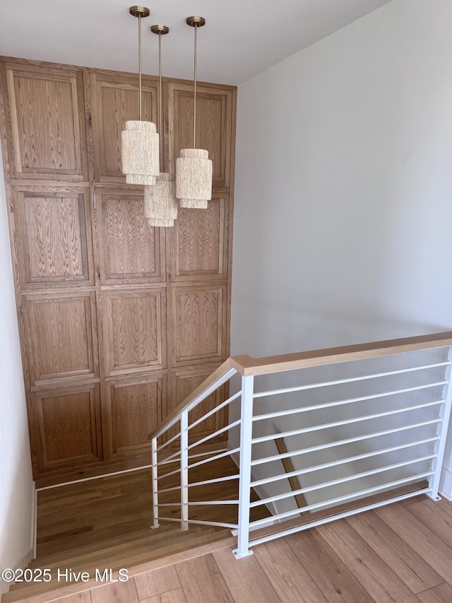 36 Fairmont St, Ocean Isle Beach, NC 28469 - stairs featuring wood finished floors