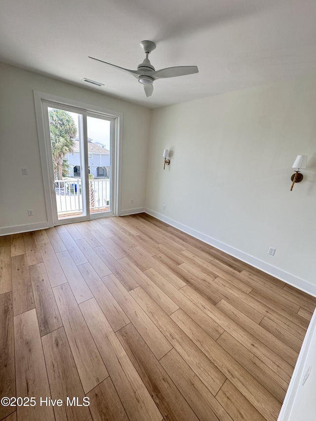 36 Fairmont St, Ocean Isle Beach, NC 28469 - spare room featuring light wood-type flooring, a ceiling fan, and baseboards