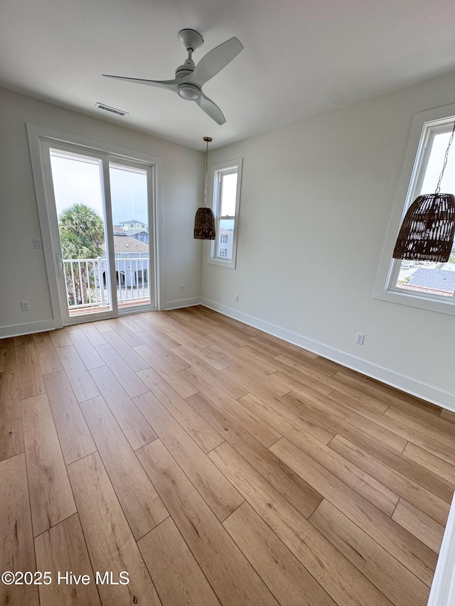36 Fairmont St, Ocean Isle Beach, NC 28469 - unfurnished room with ceiling fan, light wood-type flooring, and baseboards