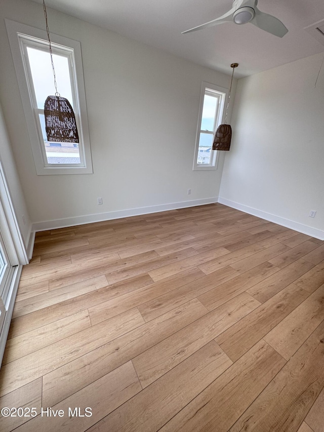 36 Fairmont St, Ocean Isle Beach, NC 28469 - unfurnished room featuring light wood-style floors, ceiling fan, and baseboards