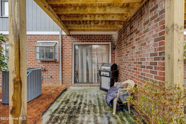 view of patio / terrace featuring cooling unit and grilling area