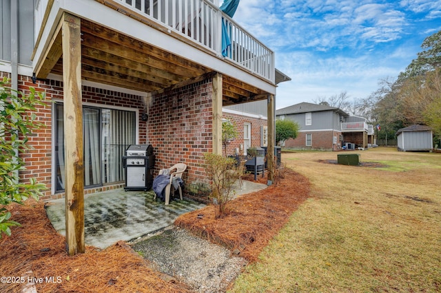 exterior space featuring a lawn and a patio