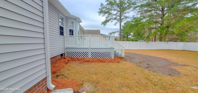 view of yard featuring a deck