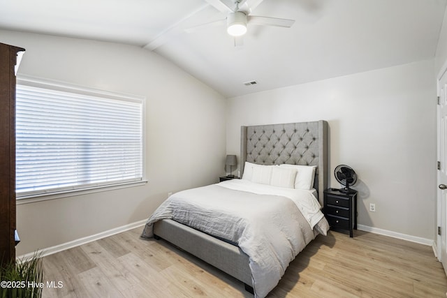 bedroom featuring vaulted ceiling, ceiling fan, and light wood-type flooring