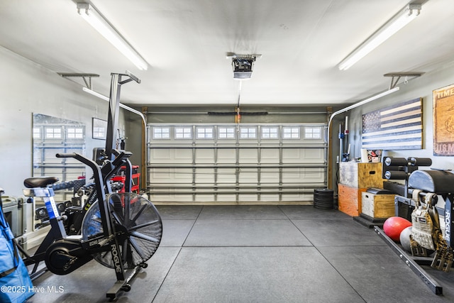 garage featuring a garage door opener