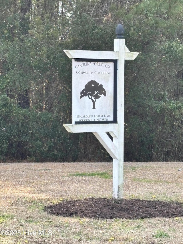 exterior details featuring a forest view